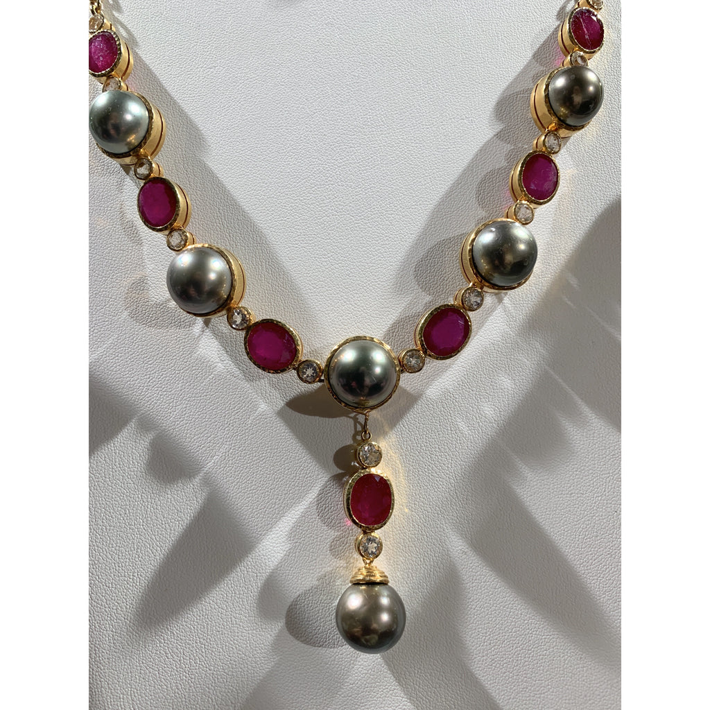 Ruby and black Tahitian South Sea pearl drop Y necklace
