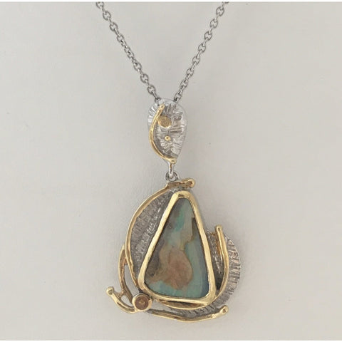 One-of-a-kind sterling and gold Opal pendant with sapphire