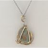 One-of-a-kind sterling and gold Opal pendant with sapphire