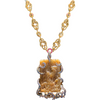 Carved Burmese Jade with hammered gold link chain and sapphire accents